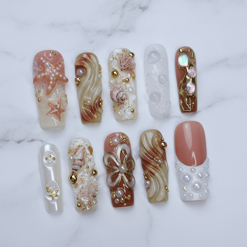 Ocean pearl 3D starfish shell abalone custom press-on nails terracotta swirl blush pink full set flat lay — LuxepressCo