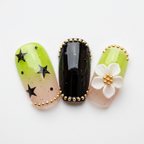 Macro close-up lime green gradient black starburst gold bead solid black 3D white flower gold starburst center square nail art — LuxepressCo