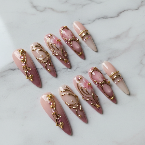 Hero shot full set 10 luxury 3D gold filigree pink floral stiletto custom press-on nails white marble background — LuxepressCo