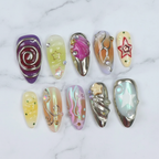 Chrome aurora holographic custom press-on nails long almond full set on marble studio — LuxepressCo
