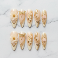Flat lay top-down full set 10 gold dragonfly floral custom press-on nails cream ivory — LuxepressCo