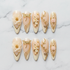 Flat lay top-down full set 10 gold dragonfly floral custom press-on nails cream ivory — LuxepressCo