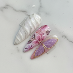 Macro close-up hand-painted floral botanical and marble swirl custom press-on nails pink purple — LuxepressCo