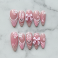 Flat lay top-down full set 10 pink bunny blossom reusable salon-quality press-on nails — LuxepressCo