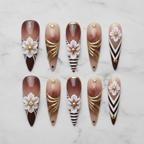 Flat lay top-down full set 10 brown ombre floral gold foil custom press-on nails marble — LuxepressCo