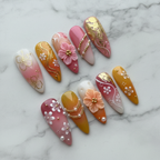 Full set 10 pink gold 3D floral press-on nails on marble background custom press-on nails almond shape — LuxepressCo