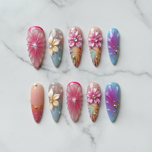 Flat lay top-down full set 10 custom press-on nails 3D floral pastel ombre rhinestone gold beads marble background — LuxepressCo