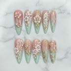 Flat lay top-down full set 10 mint green butterfly floral 3D custom press-on nails white marble — LuxepressCo