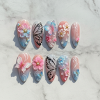 Flat lay top-down 10 custom press-on nails 3D sakura butterfly pastel ombre full set — LuxepressCo
