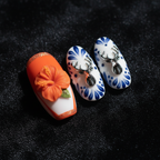 3D hibiscus Talavera folk art custom press-on nails orange French tip navy blue botanical macro close-up — LuxepressCo