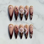 Flat lay top-down full set 10 burgundy orchid 3D floral stiletto custom press-on nails white marble — LuxepressCo