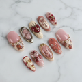 Dark romance sacred heart gold chrome liquid metal custom press-on nails vintage portrait bow charm full set flat lay — LuxepressCo