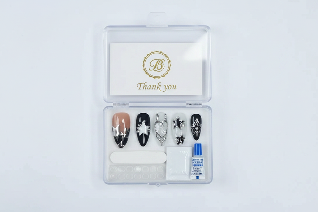 LuxepressCo acrylic packaging box open with black star press-on nails set and accessories — LuxepressCo