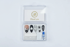 LuxepressCo acrylic packaging box open with black star press-on nails set and accessories — LuxepressCo