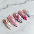 Macro close-up pearl shimmer iridescent shell texture custom press-on nails pink turquoise white marble — LuxepressCo