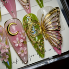 Macro close-up 3D gold chrome butterfly baroque scroll cherry blossom custom press-on nails green pink — LuxepressCo
