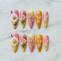 Flat lay top-down full set 10 3D floral garden reusable salon-quality press-on nails pink orange ombre — LuxepressCo